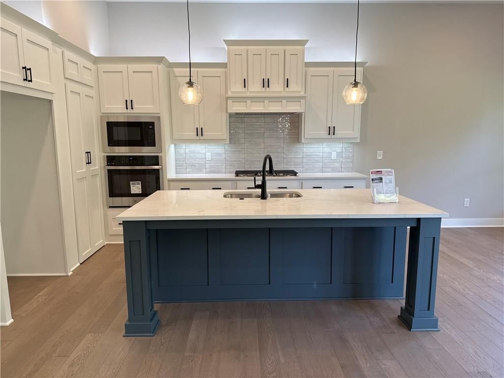 12710 NW Bittersweet Drive — photo 3