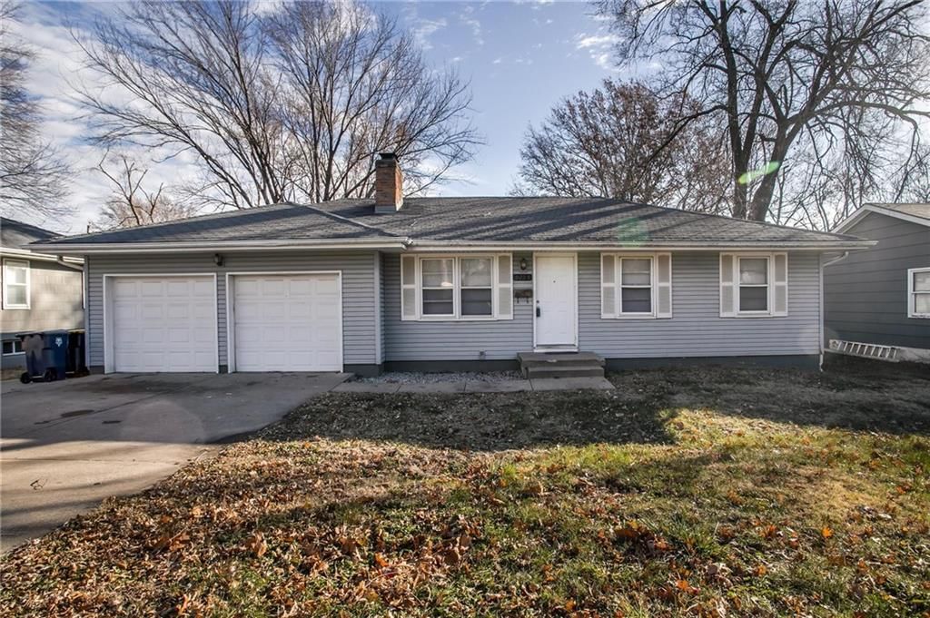 9203 JAMES A REED Road — photo 1