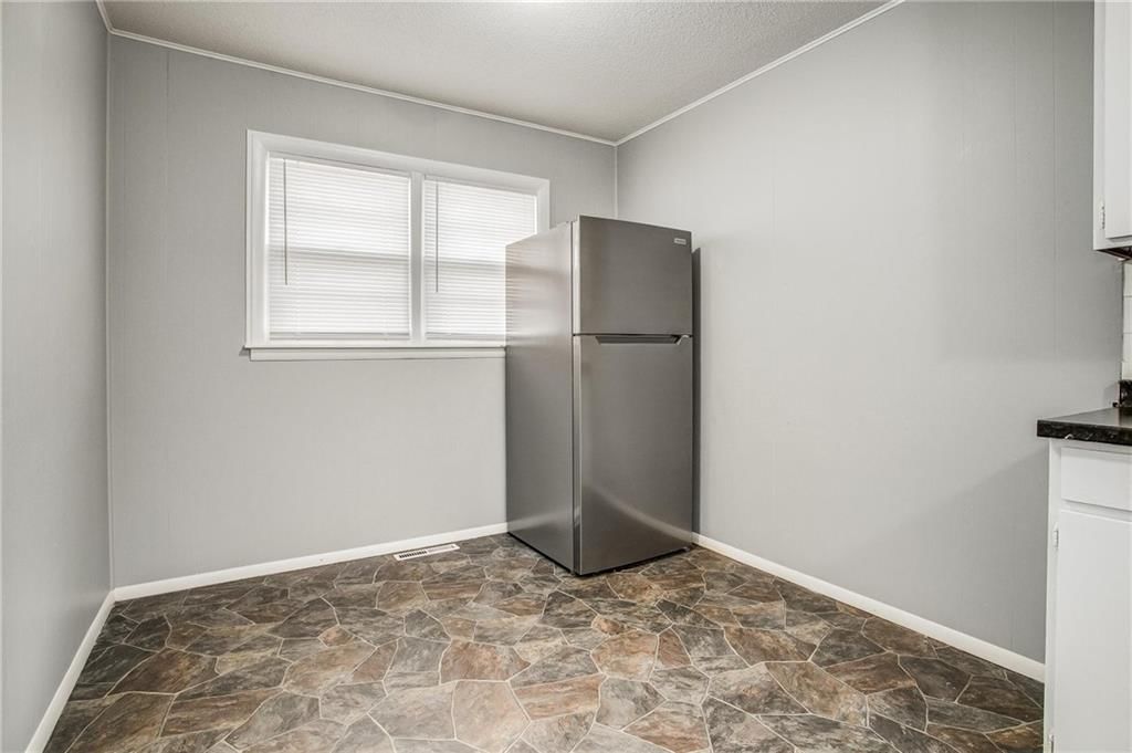 9203 JAMES A REED Road — photo 11