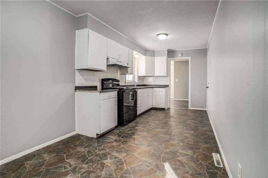 9203 JAMES A REED Road — photo 12