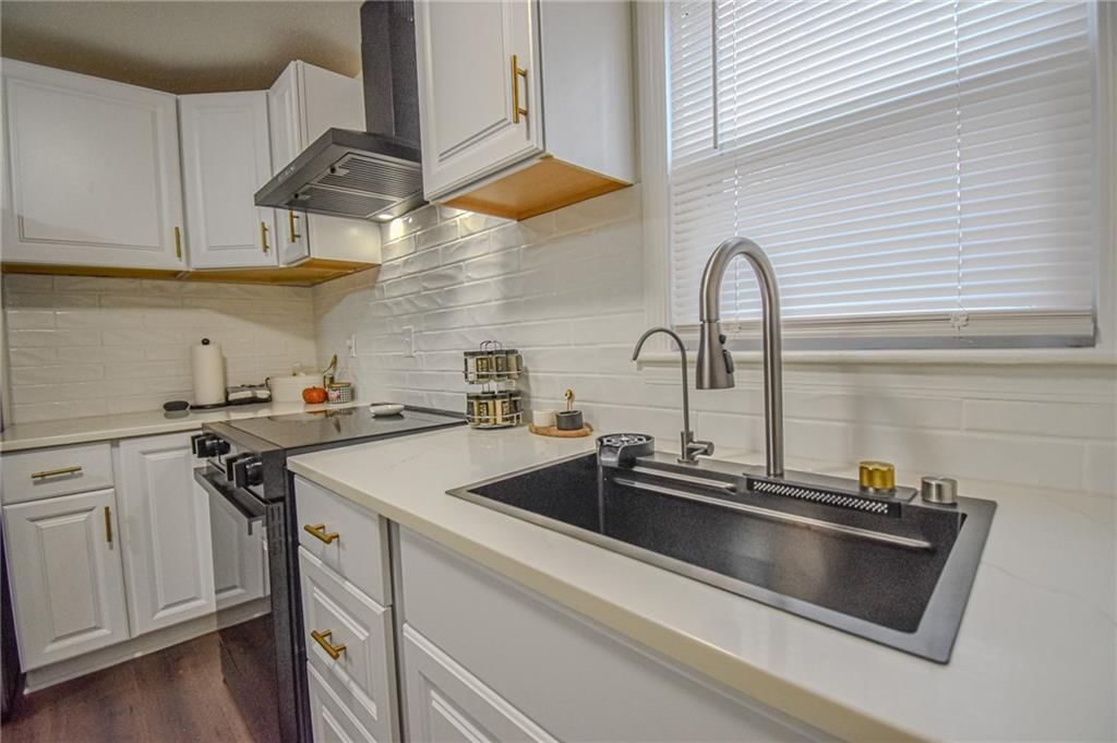 4400 WOODLAND Avenue — photo 5