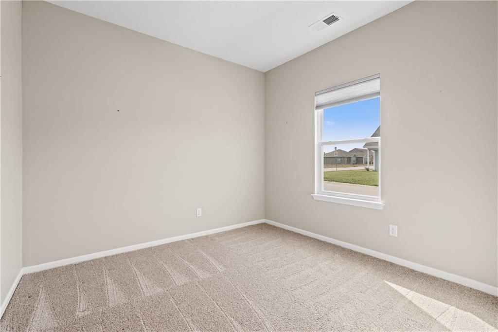 1210 NE White Oaks Lane — photo 27