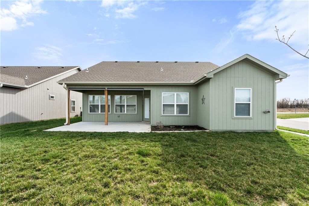 1210 NE White Oaks Lane — photo 31