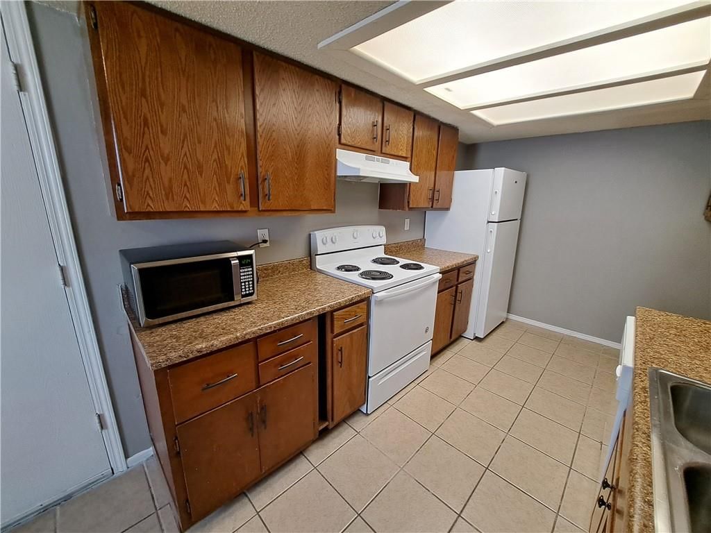 10009 NW Lema Drive — photo 17