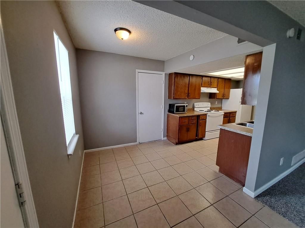 10009 NW Lema Drive — photo 18