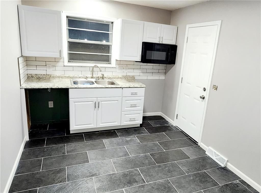 1601 W 24th` Terrace S — photo 11