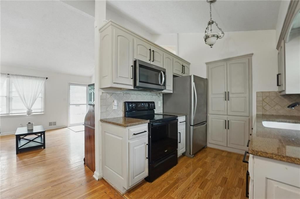 10417 W 73rd Terrace — photo 7