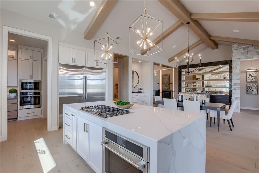 Gas range and double oven at 13610 Granada Drive, Leawood, KS 66224
