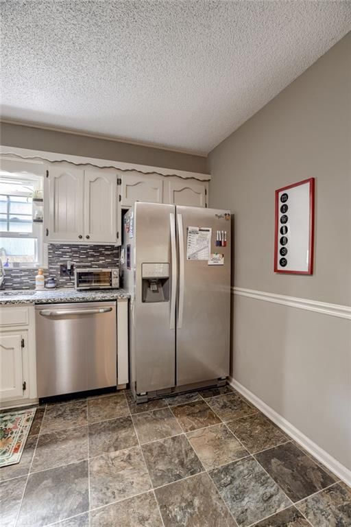 6716 NW Sioux Drive — photo 8