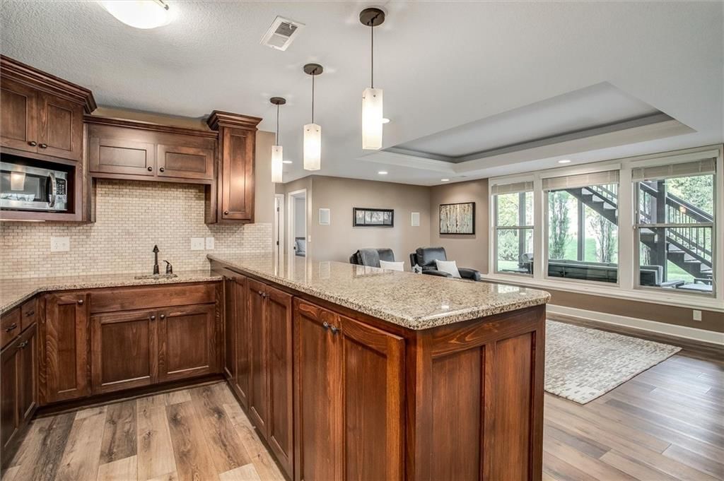 1609 NE Woodland Shores Drive — photo 25