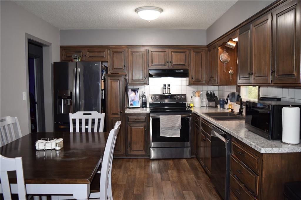 7724 NW Milrey Drive — photo 6