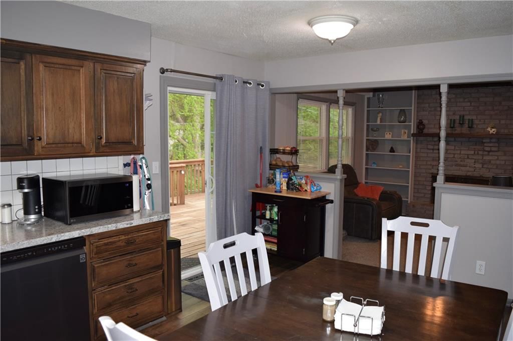 7724 NW Milrey Drive — photo 8