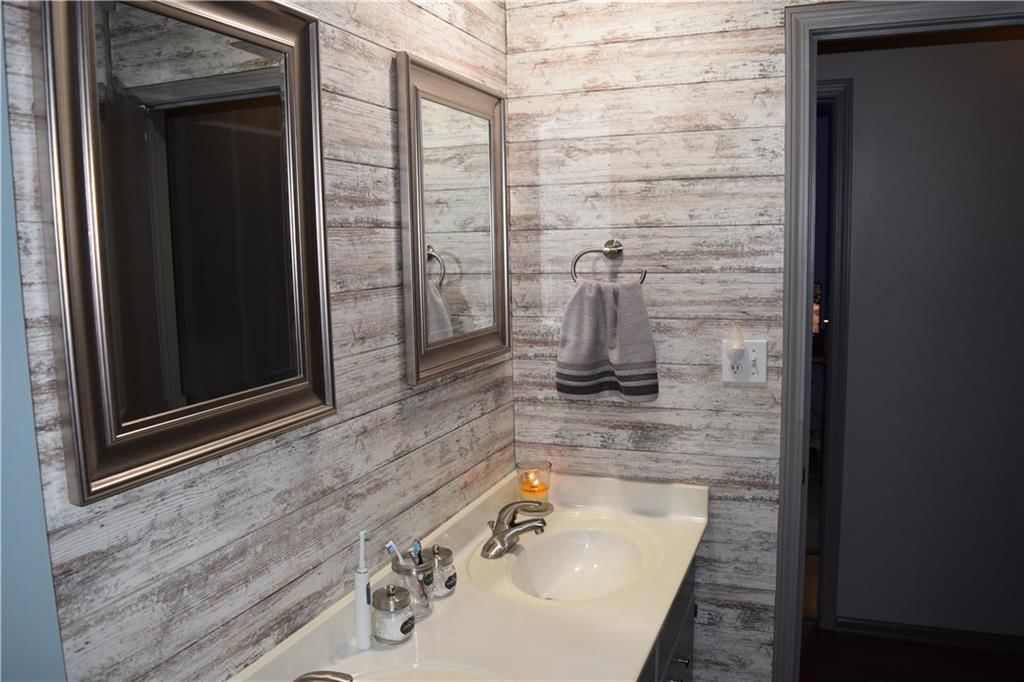 7724 NW Milrey Drive — photo 18