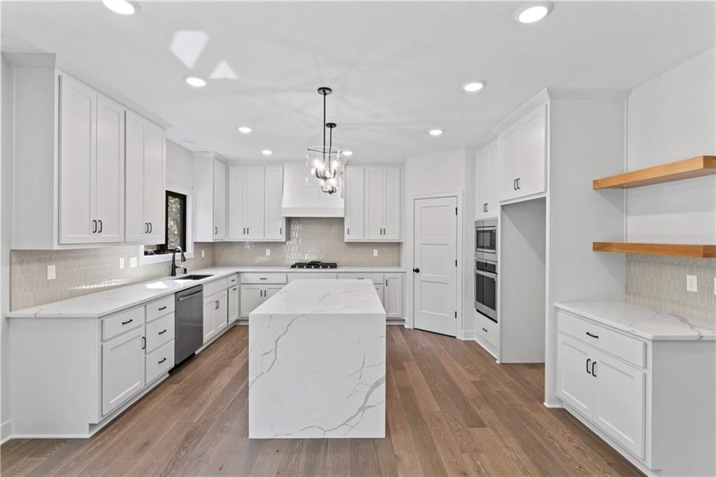 7015 NW Forest Lakes Drive — photo 8