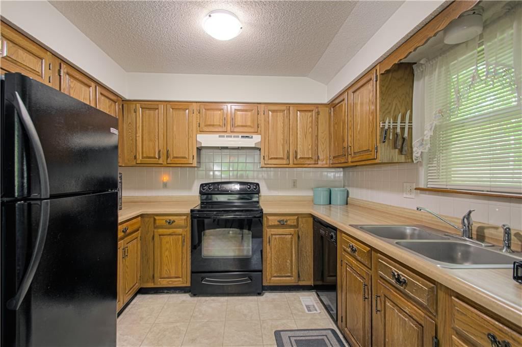 10648 N Oak Trafficway — photo 12
