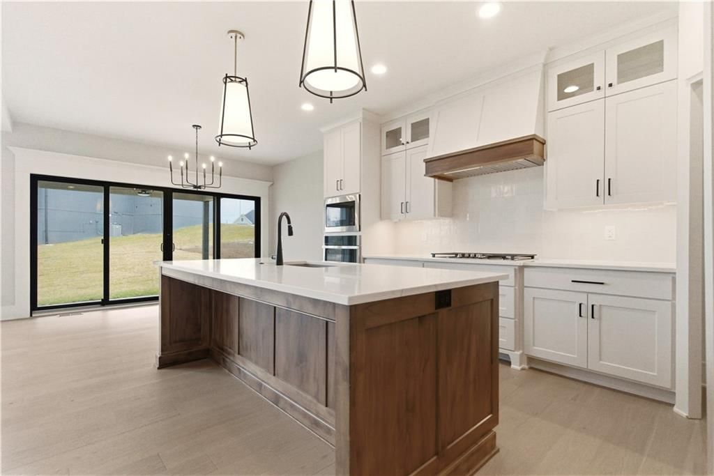 2531 NE Woodland Oak Circle — photo 16