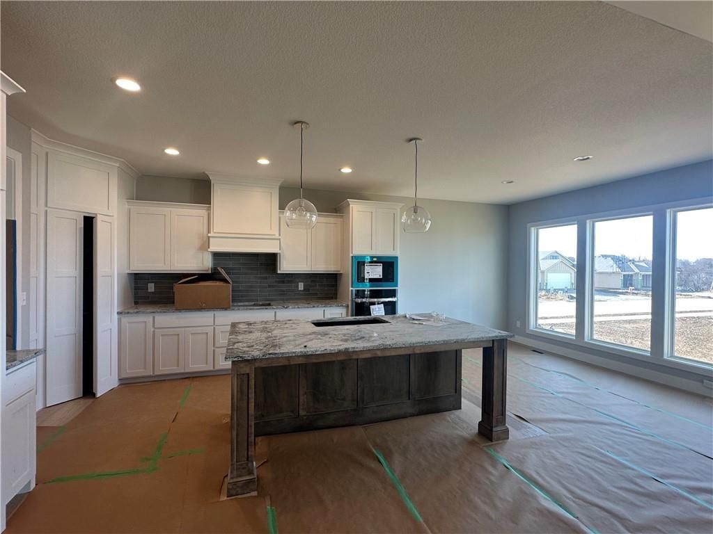 7040 NW Forest Lakes Drive — photo 5