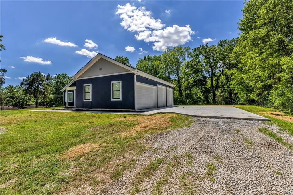 7844 James A Reed Road — photo 2