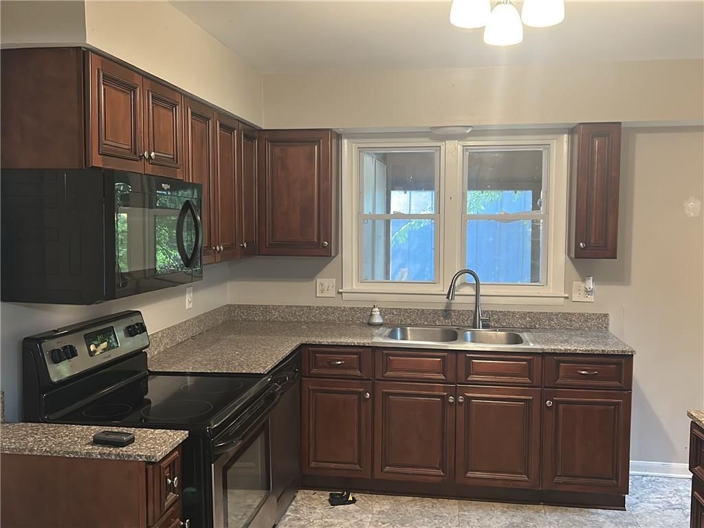 10902 W 71st Place — photo 2