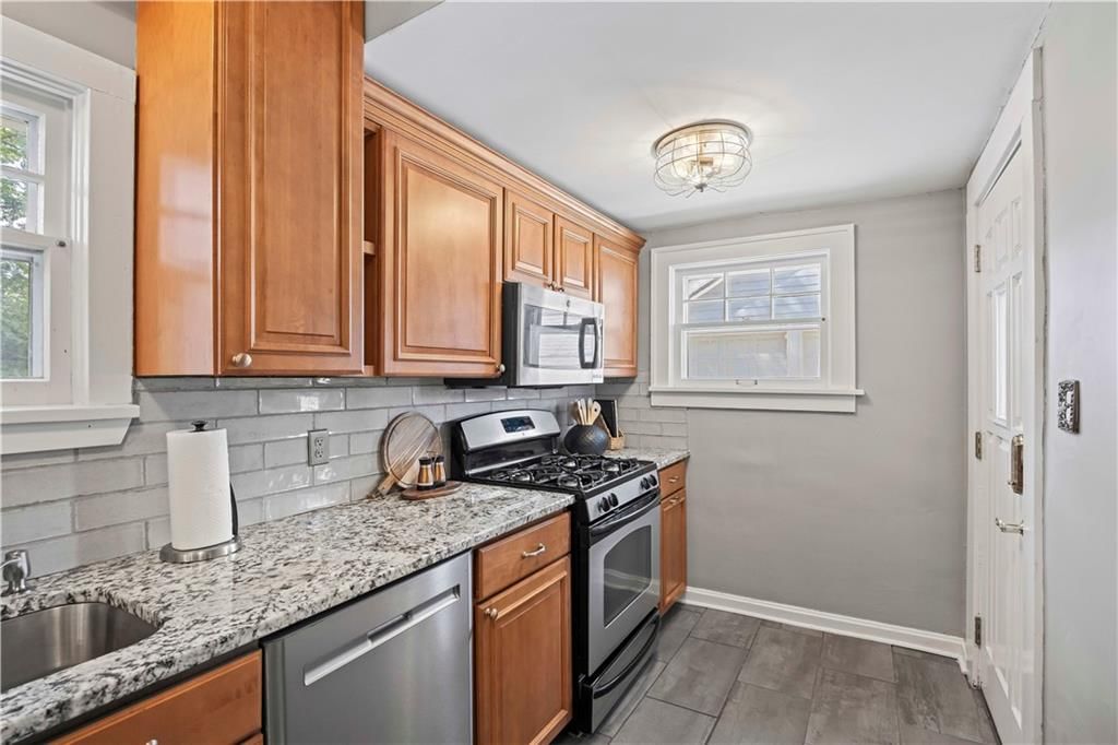 114 W 65th Terrace — photo 14