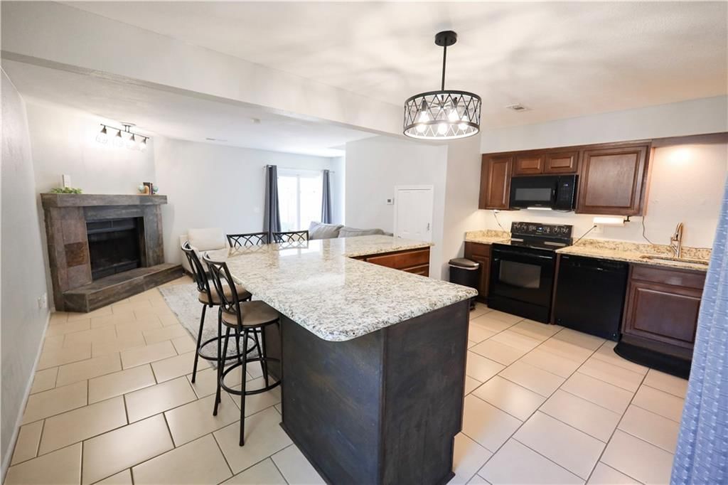 107 NE Greystone Drive — photo 4