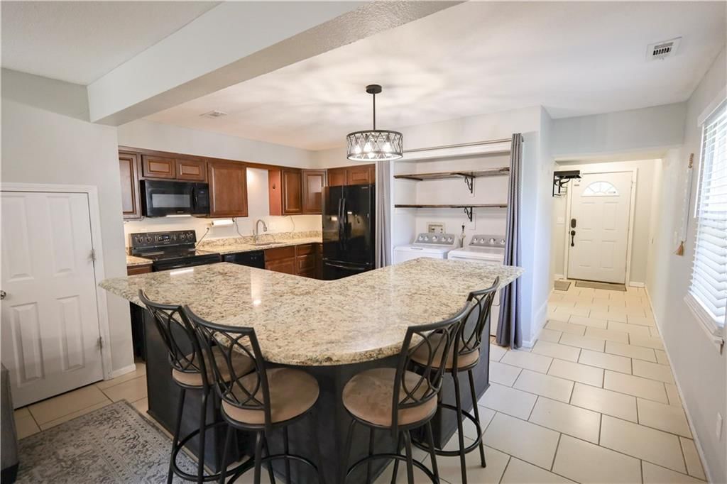 107 NE Greystone Drive — photo 5