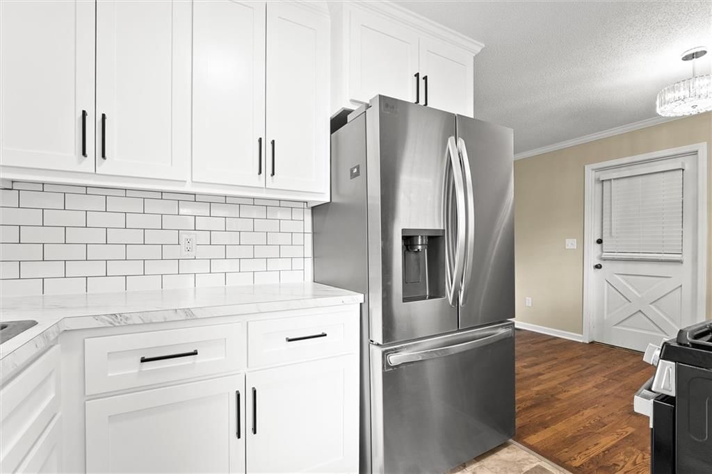 7803 E 50th Terrace — photo 9
