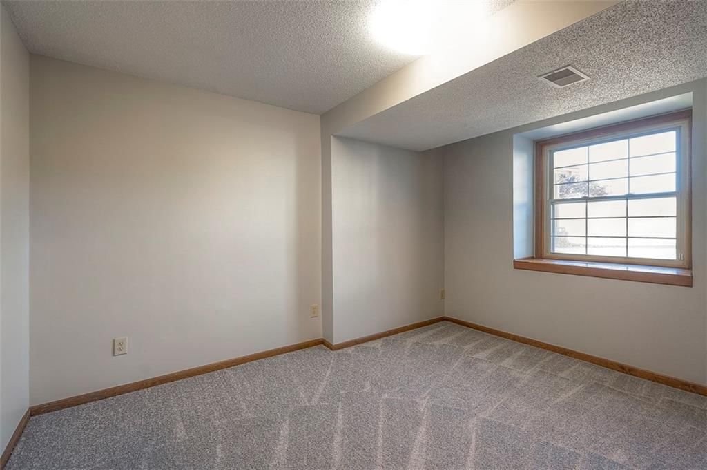 4910 NE Pebble Beach Street — photo 28