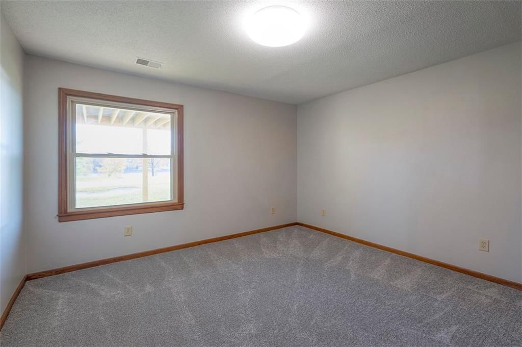 4910 NE Pebble Beach Street — photo 30