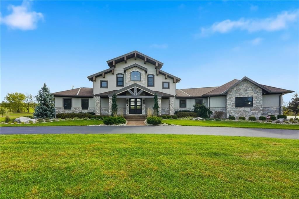 10807 NW Tiffany Springs Road — photo 1