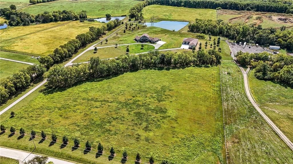 10807 NW Tiffany Springs Road — photo 10