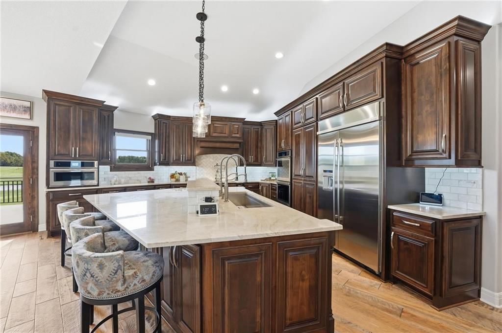 10807 NW Tiffany Springs Road — photo 29