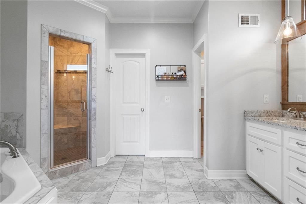 7445 NW Forest Lakes Drive — photo 25