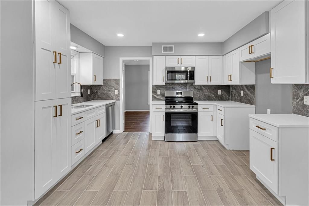 11707 E 60th Terrace — photo 12