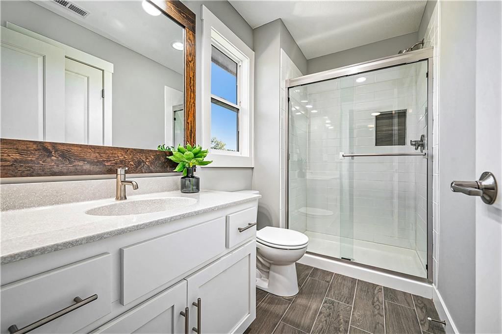 7295 NW FOREST LAKES Drive — photo 25