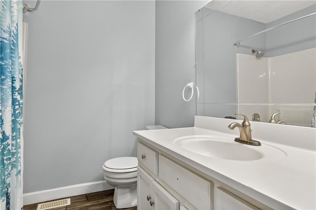 819 NE Cookingham Drive — photo 7