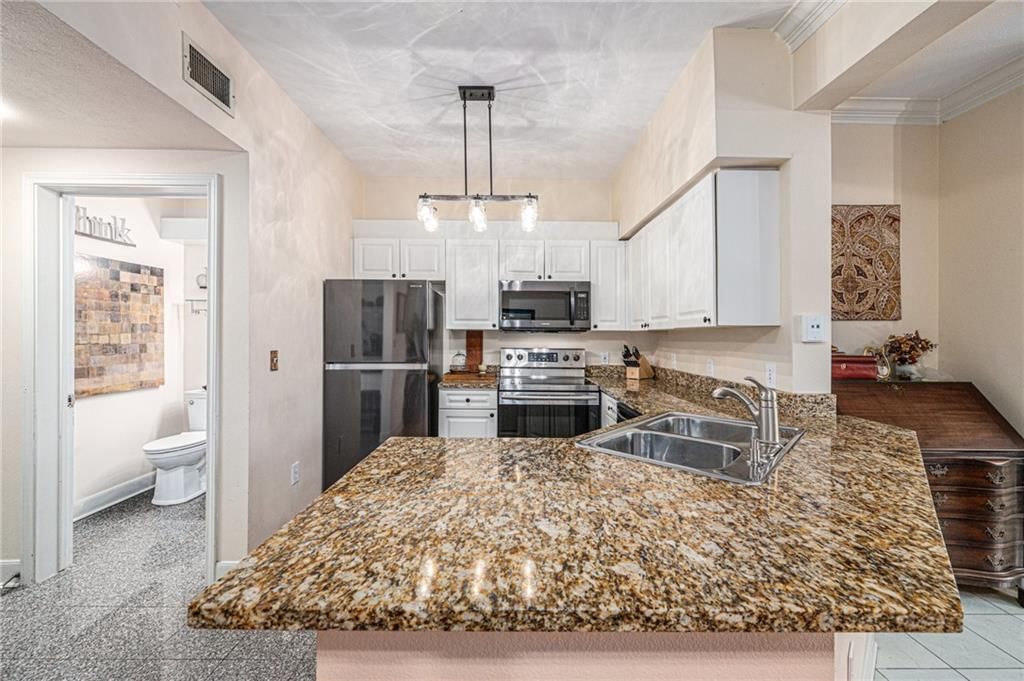 11613 Tomahawk Creek Parkway — photo 9