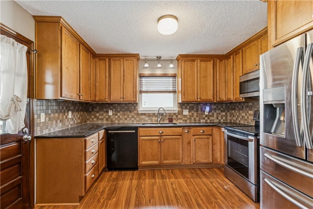 14406 W 65TH Terrace — photo 11