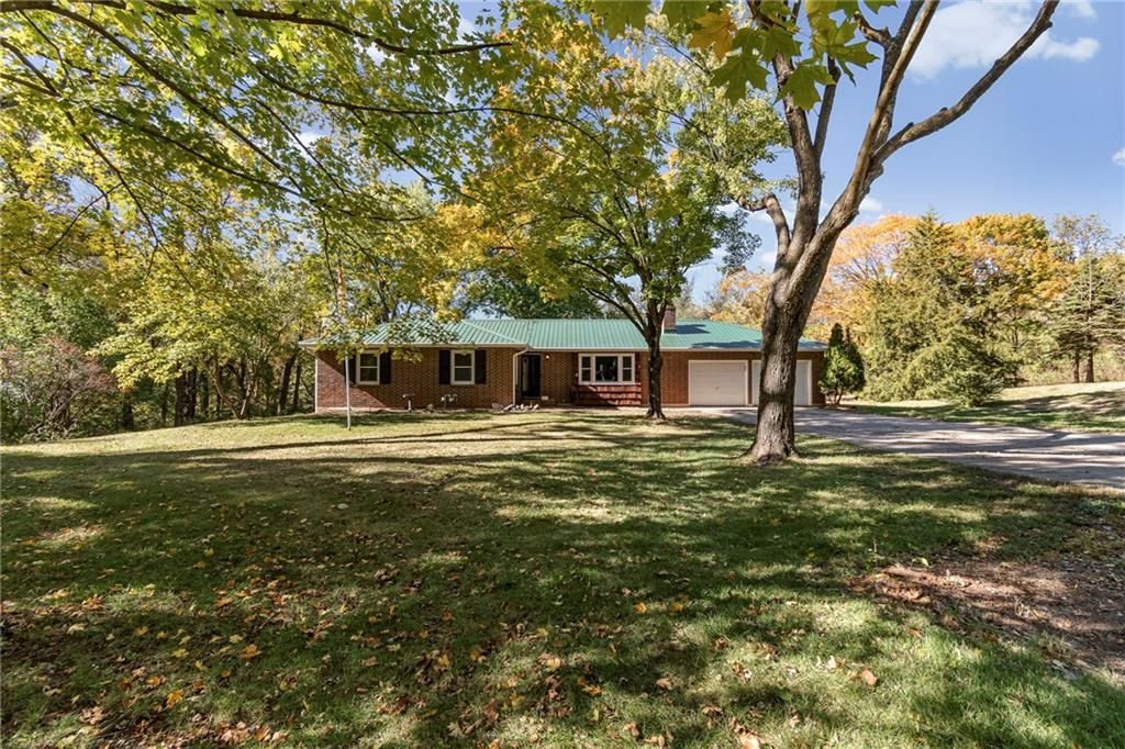 7702 NW Fawn Avenue — photo 2