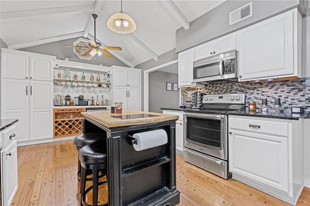 9705 NW Hampton Woods Drive — photo 6