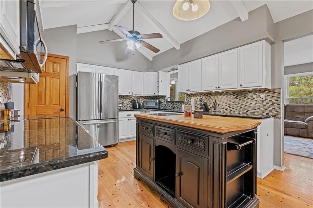9705 NW Hampton Woods Drive — photo 7