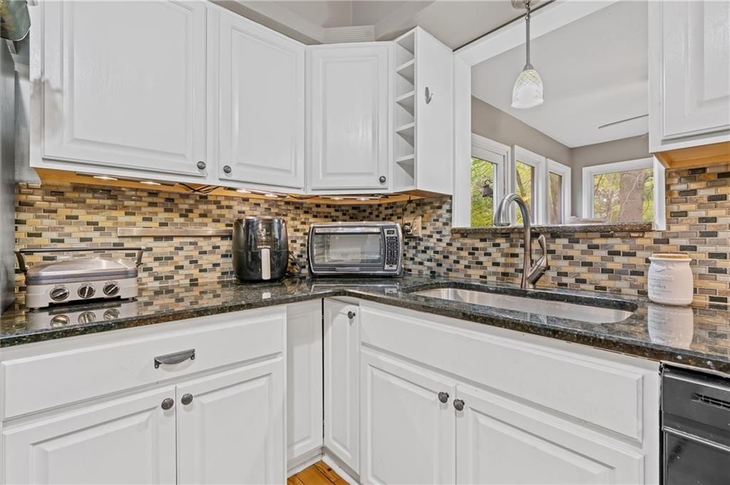 9705 NW Hampton Woods Drive — photo 9