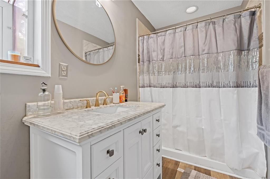9705 NW Hampton Woods Drive — photo 15