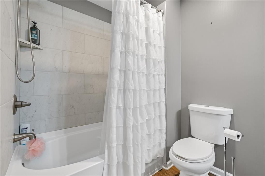 9705 NW Hampton Woods Drive — photo 17