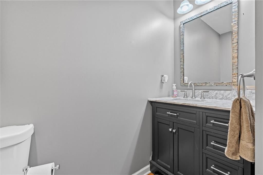 9705 NW Hampton Woods Drive — photo 18