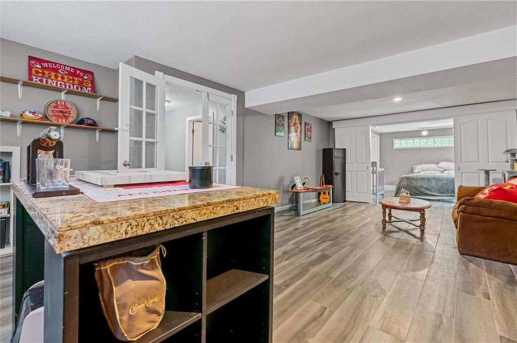 9705 NW Hampton Woods Drive — photo 20
