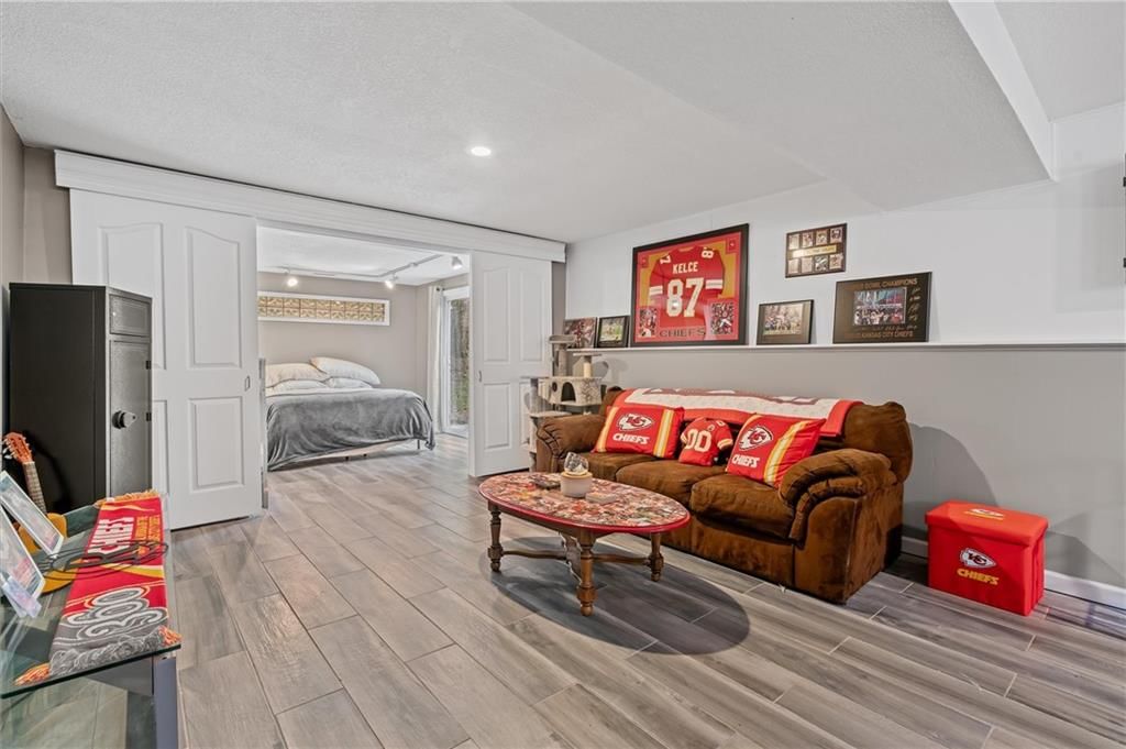 9705 NW Hampton Woods Drive — photo 21