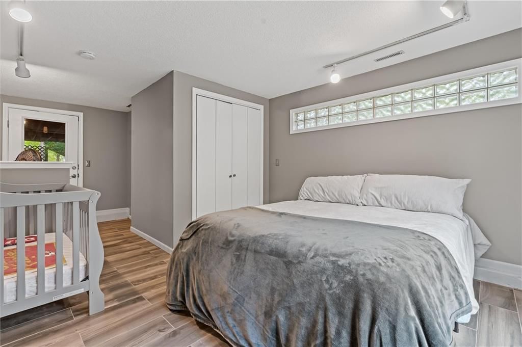 9705 NW Hampton Woods Drive — photo 22