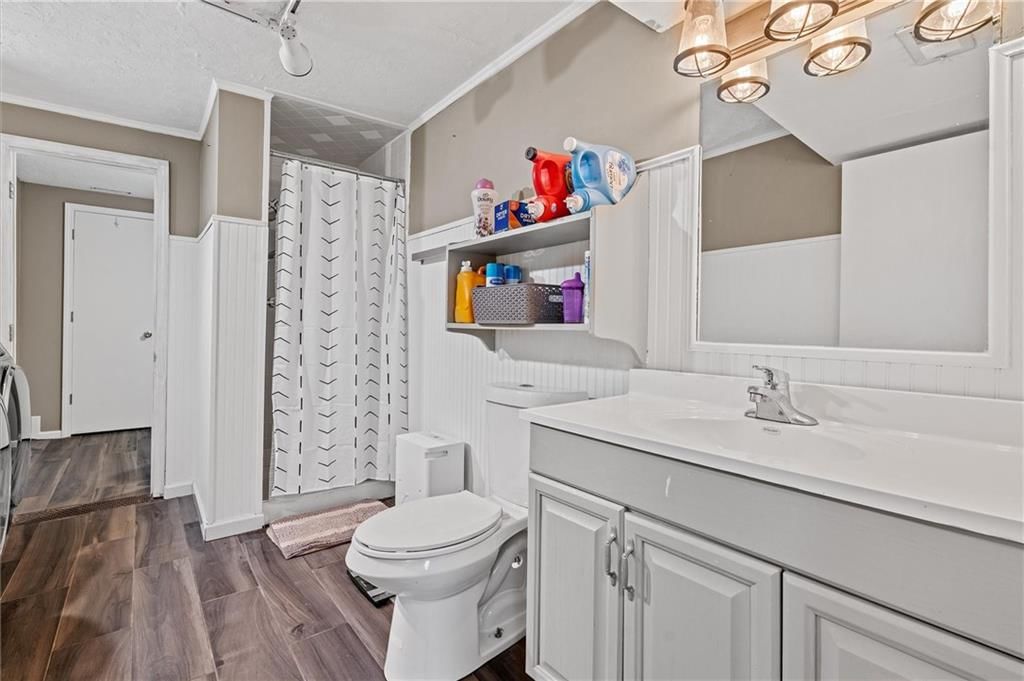 9705 NW Hampton Woods Drive — photo 23