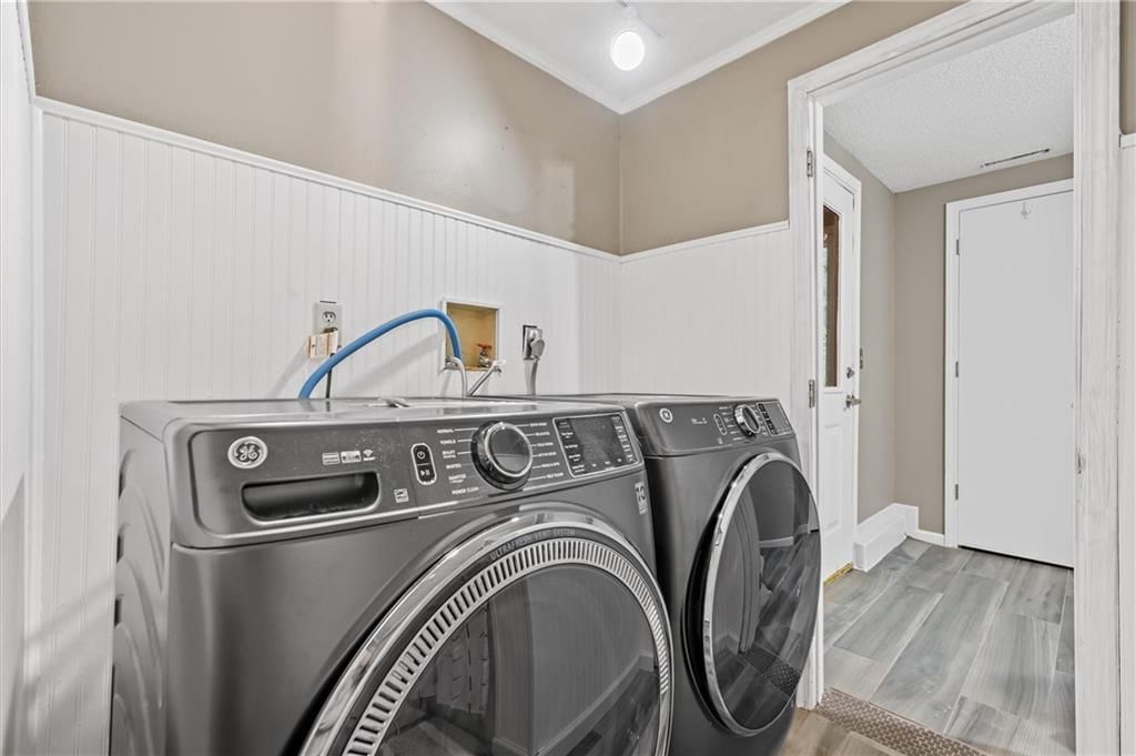 9705 NW Hampton Woods Drive — photo 24